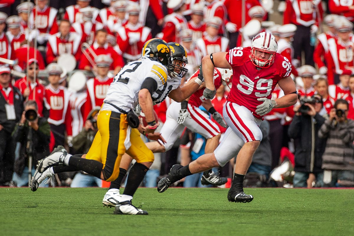Wisconsin linebacker JJ Watt chases down an Iowa running back in a football game at Camp Randall Stadium in Madison, Wisconsin in 2009.